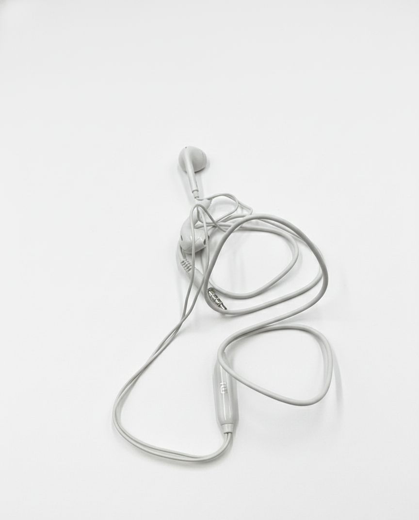 "Premium Wired In-Ear Earphones with Built-In Microphone and Tangle-Free Cable"