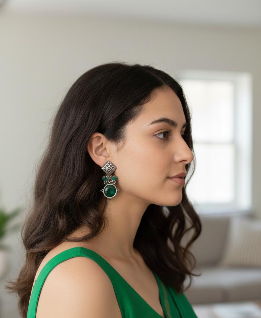 "Vintage Green Gemstone Statement Dangle Earrings with Intricate Silver Accents"