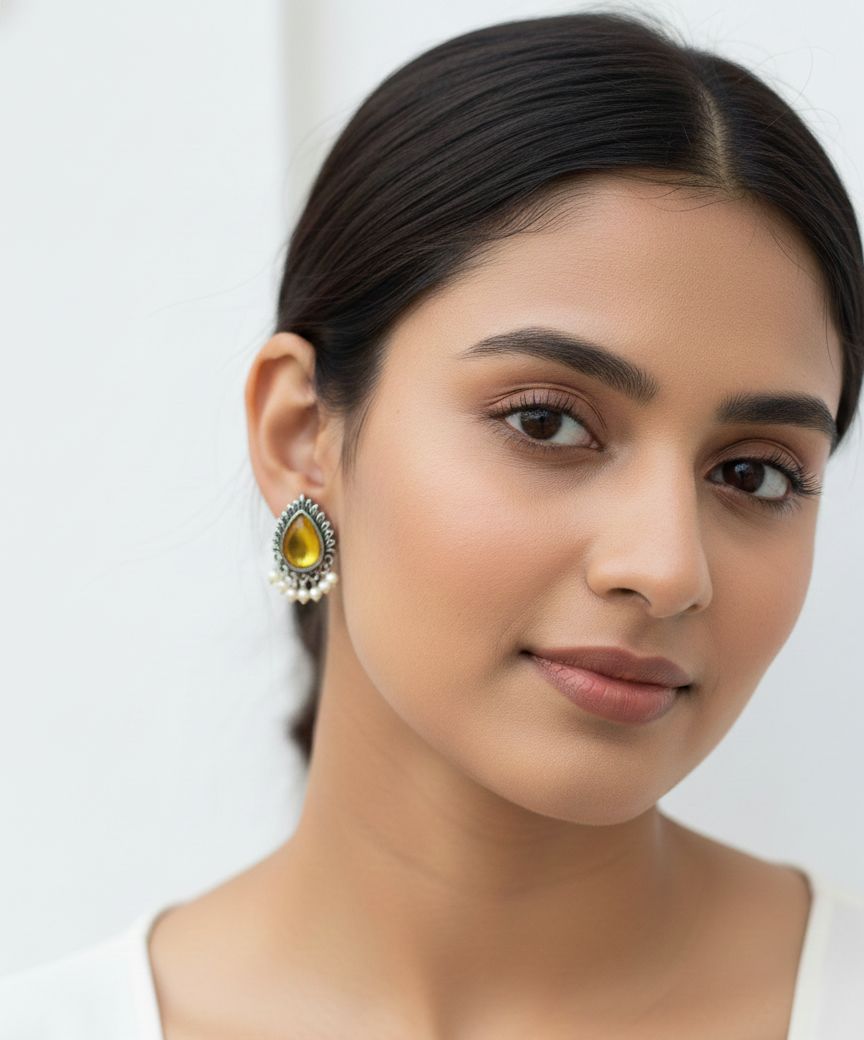 "Antique Yellow Teardrop Earrings with Pearl Dangle Design"