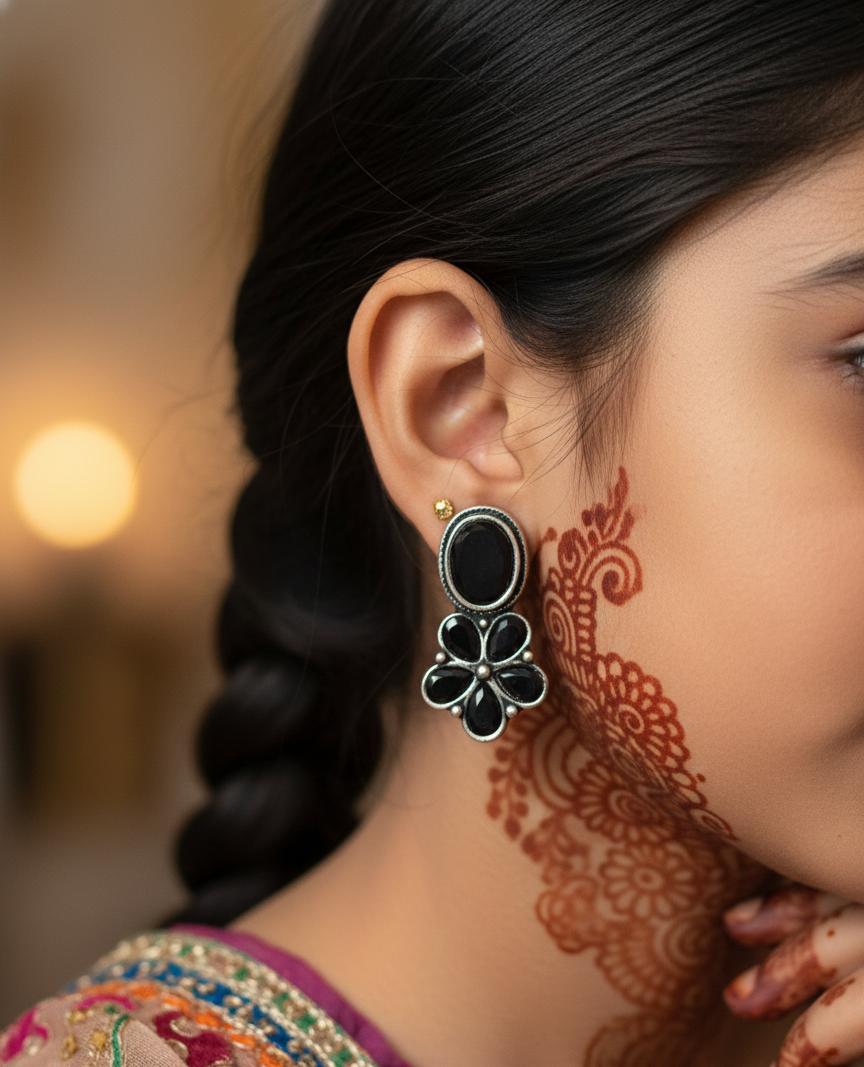 "Elegant Black Flower Drop Earrings with Silver Accents"